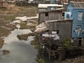 Riverine favelas, or slums, in outlying area