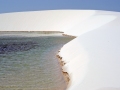 “And it is this juxtaposition that most startles: white sandy dunes interspersed with endless blue lagoons.”